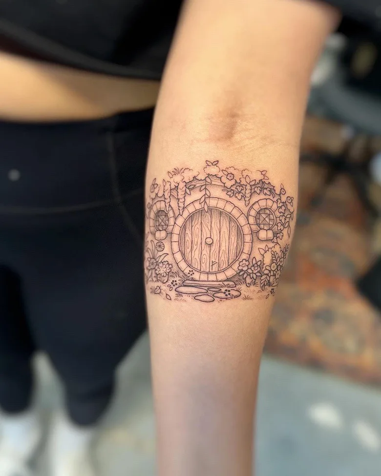 graphics The Shire hobbit house tattoo by @lordenstein_art