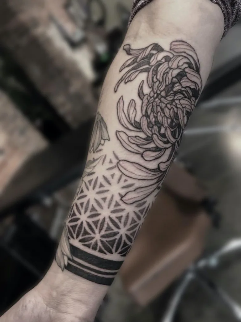 Tattoo artist X&eacute;u Jean