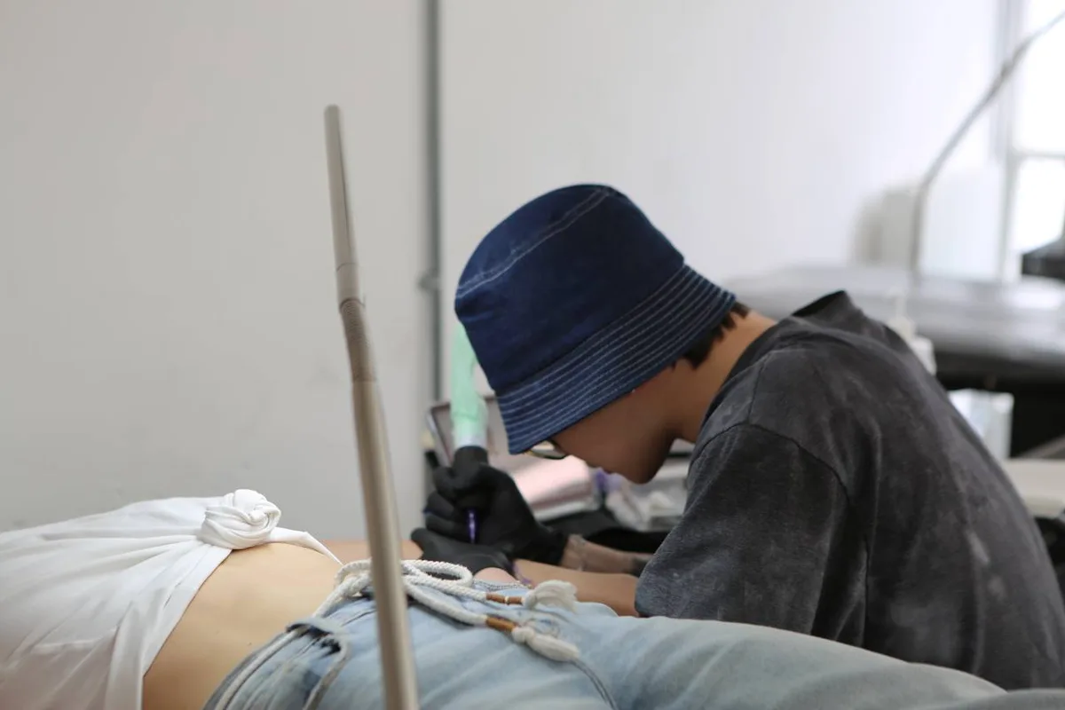 Tattoo artist Moodji