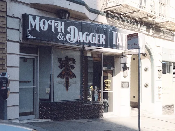 Moth and Dagger Tattoo Studio