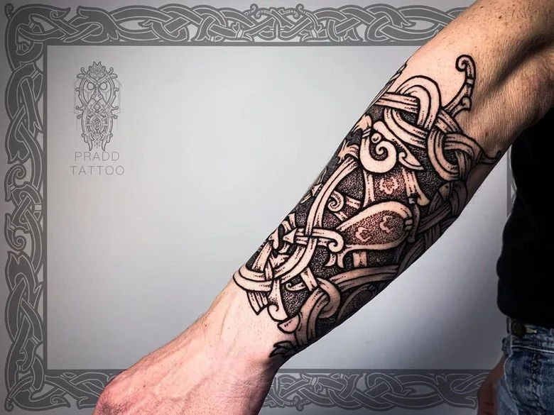 Viking runes in a tattoo by Vitaly Pradd