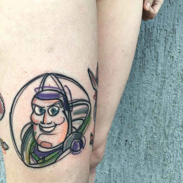 Cartoon Buzz lightyear tattoo on Thigh