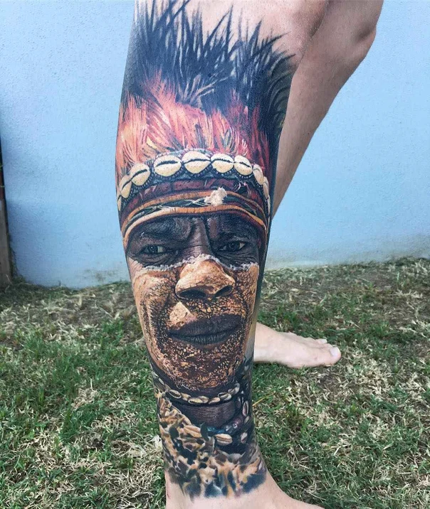 Realism Face, Tribal tattoo on Calf