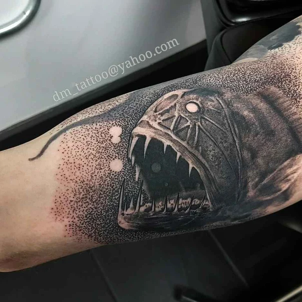 Black & Grey Fish, Sea creature tattoo on Forearm