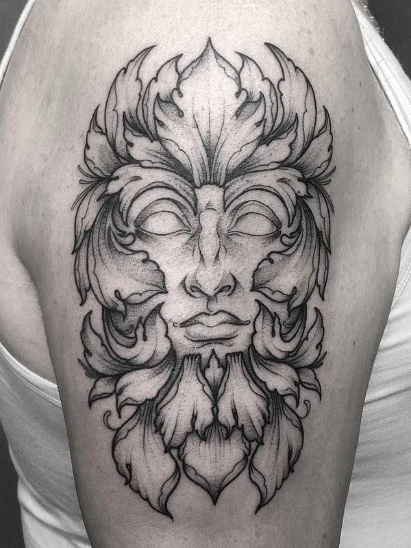 black and grey blackwork Tatuagem em upper arm #16060 | Tatuador Lozzy Bones