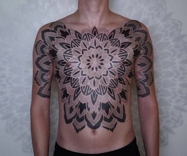 Ornamental Mandala tattoo on Chest