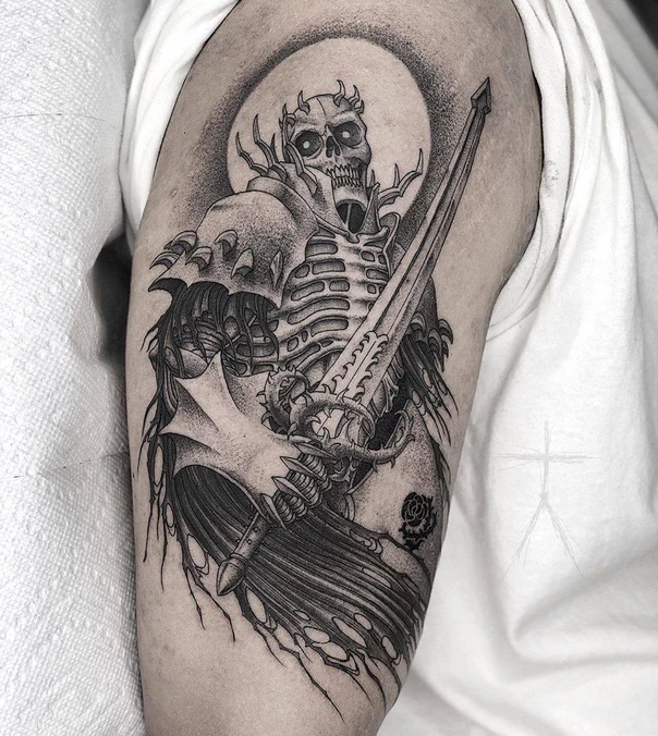 Blackwork Skull, Sword tattoo on Upper Arm