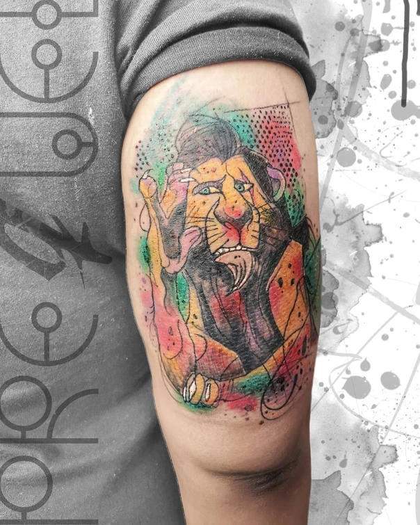 Watercolor Lion tattoo on Bicep