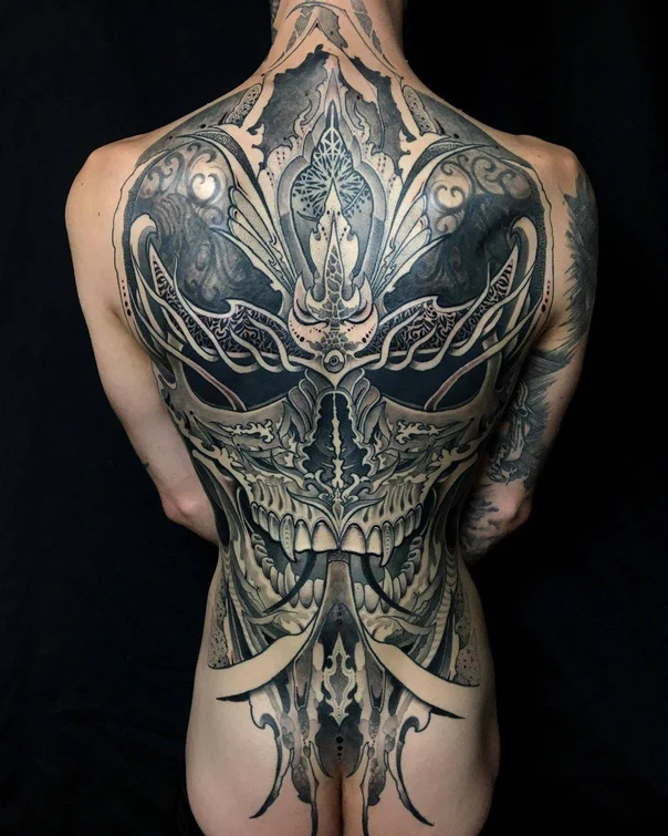 Blackwork Skull, Ornamental tattoo on Full Back