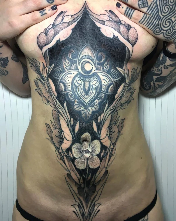 Ornamental Mandala, Flower tattoo on Sternum