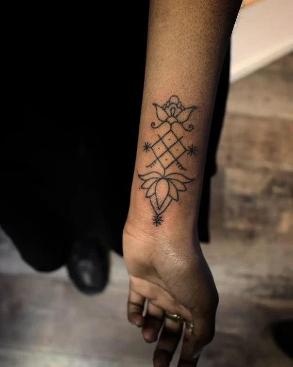 Linework Lotus, Geometric tattoo on Wrist
