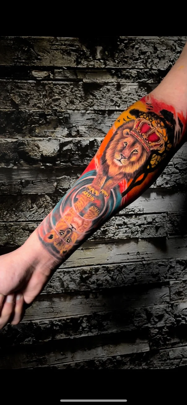 Realism Lion, Crown tattoo on Forearm