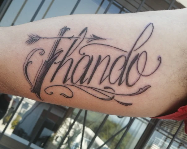 Lettering Arrow, Calligraphy tattoo on Forearm