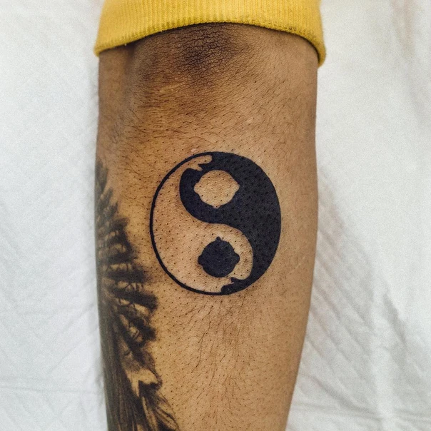Blackwork Yin yang tattoo on Forearm