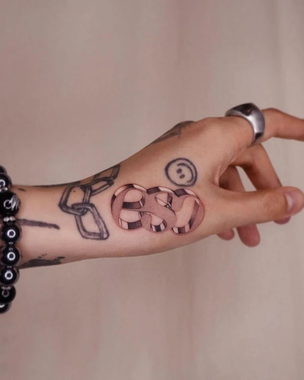 Geometric Letters tattoo on Hand