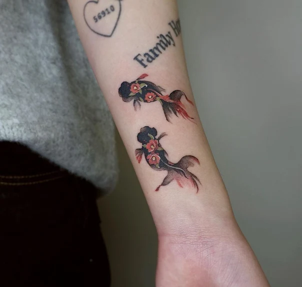Illustrative Fish, Flowers tattoo on Forearm