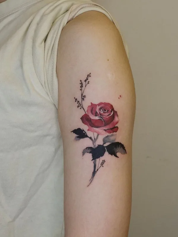 color watercolor tatuaje en upper arm #47242 | Tatuador Yi Ching