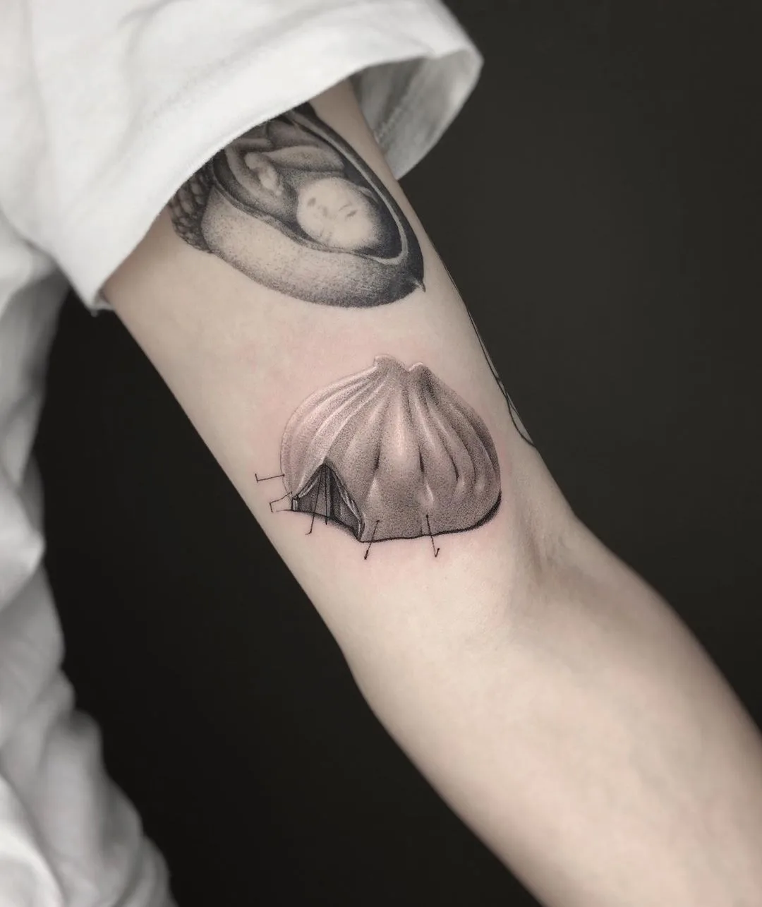 Tatuaggi miniaturizzati di Rei in Cina