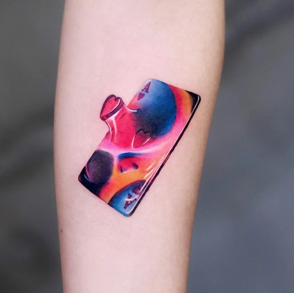 Abstract Playing card, Heart tattoo on Forearm