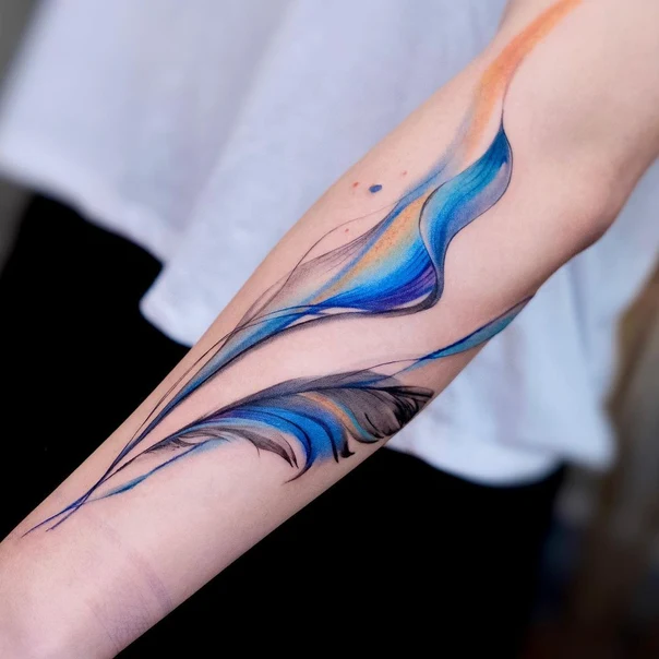 Watercolor Feather tattoo on Forearm