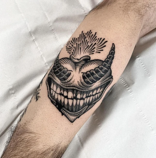 Blackwork Face, Demon tattoo on Forearm