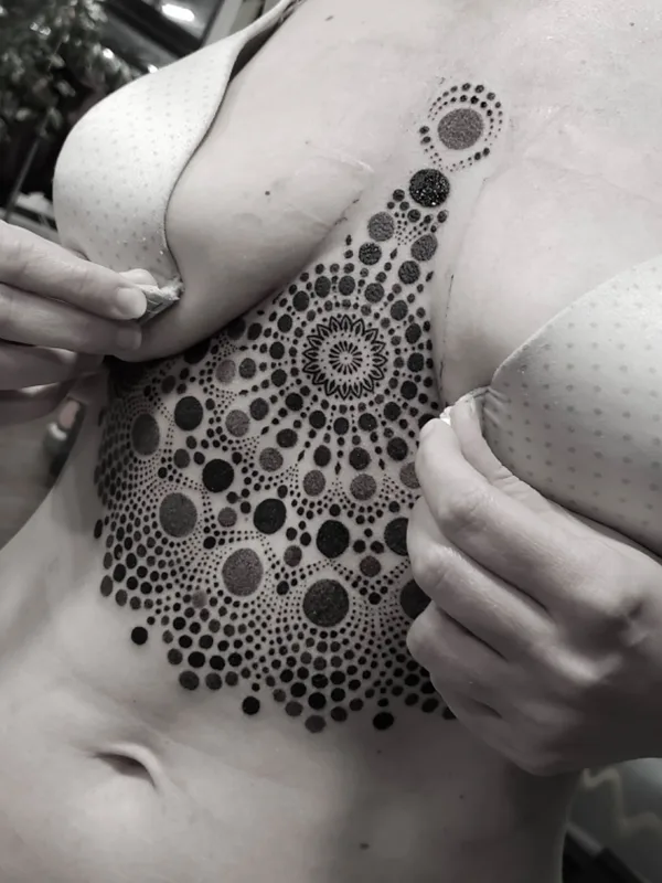 female black ornamental Tatuaggio su chest #49009 | Tatuatore ILYA CASCAD