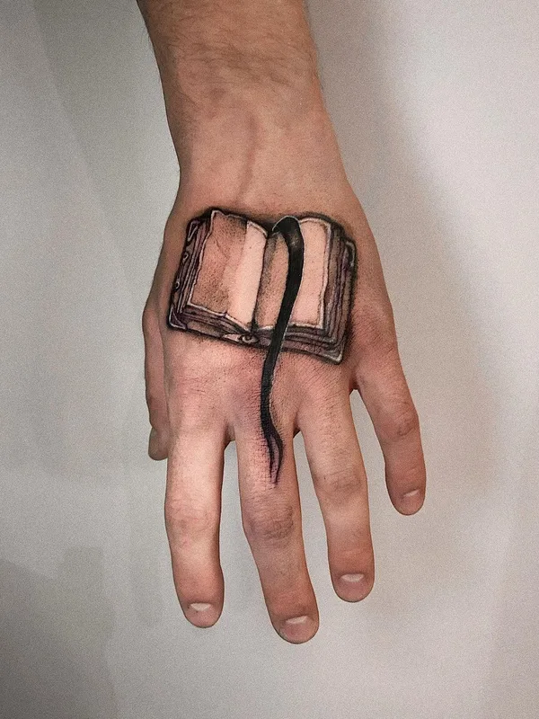 black and grey black and grey татуировка на back of hand #49295 | Тату мастер Darina Bondarenko