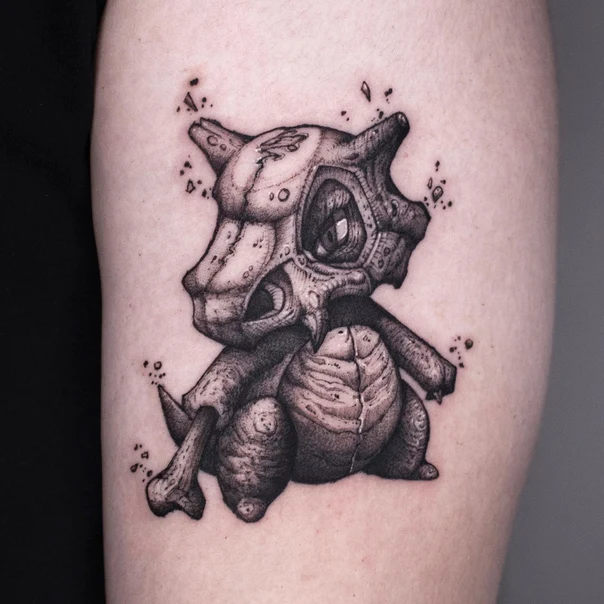Black & Grey Pokemon, Skull tattoo on Bicep