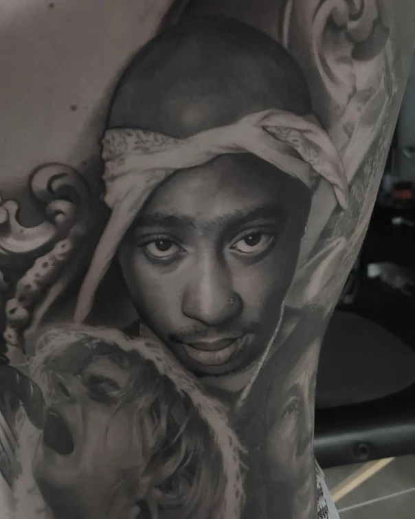 Realism Portrait tattoo on Upper Arm