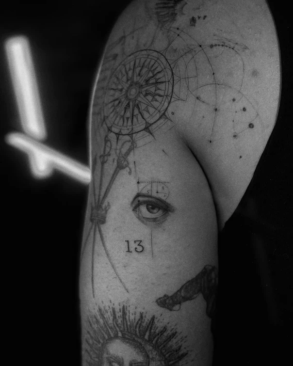 Sketch Compass, Eye tattoo on Upper Arm
