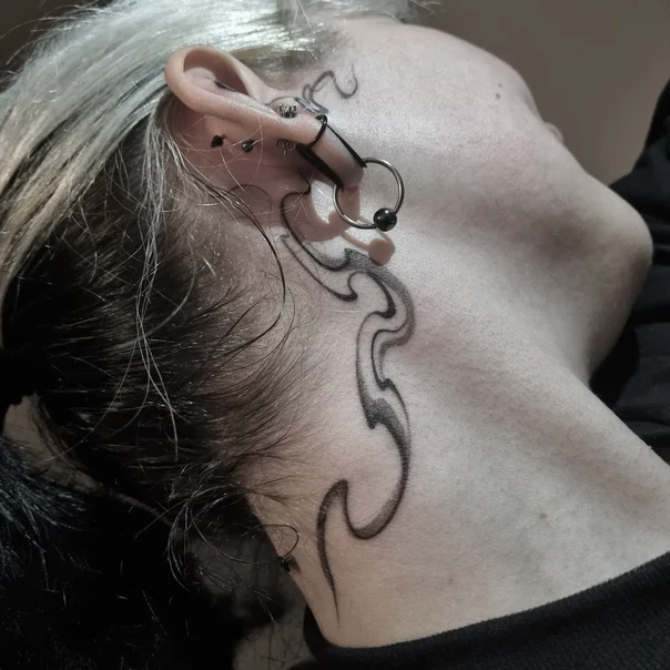 Tribal Abstract tattoo on Neck
