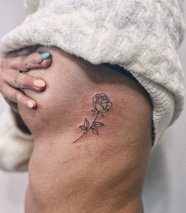 Fineline Rose tattoo on Side