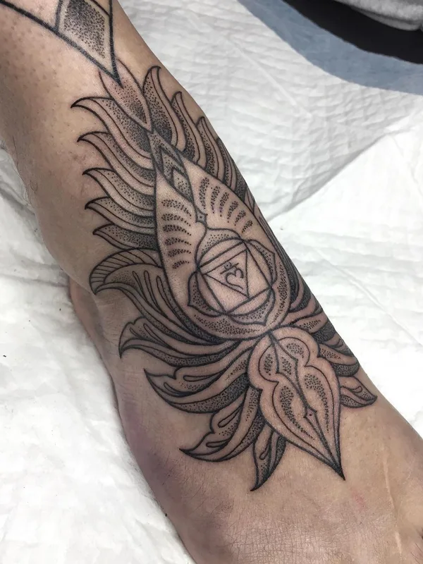 black blackwork tattoo on foot #63109 | Tattoo Artist Jon James Case