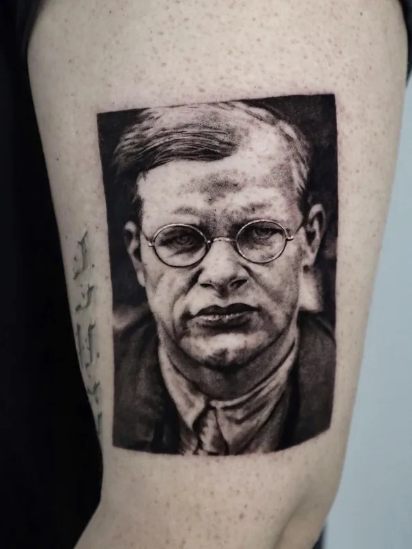 black and grey photorealism tattoo on upper arm #63196 | Tattoo Artist Kate Sv