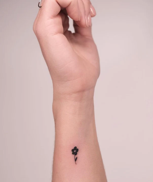 Minimalism Flower tattoo on Wrist