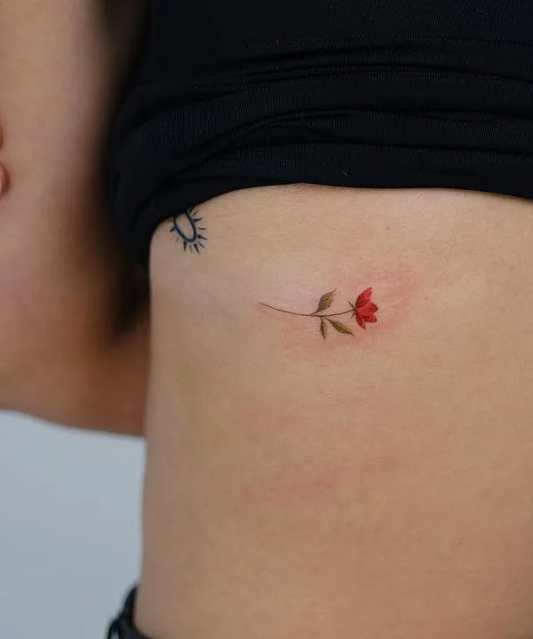 female color botanic Tatuaggio su ribcage #63364 | Tatuatore JK KIM
