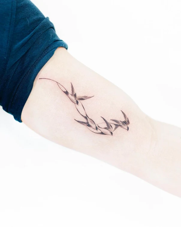Fineline Birds tattoo on Forearm