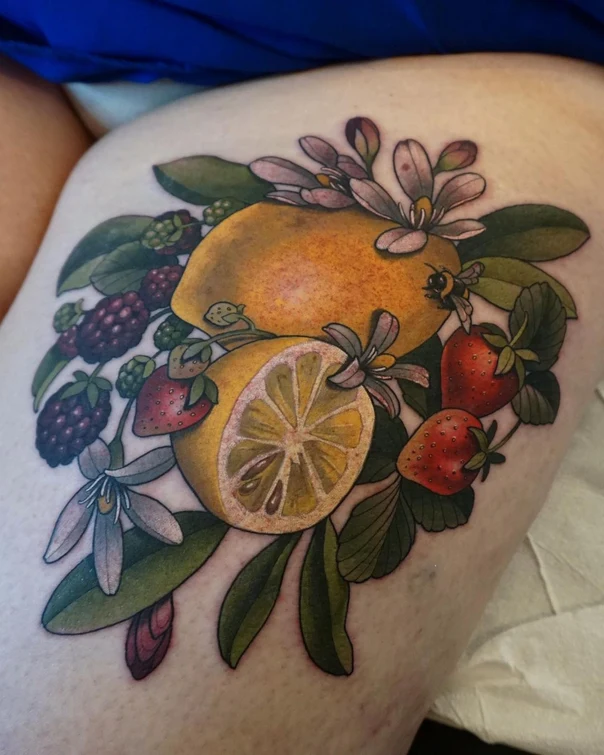 Illustrative Lemon, Strawberry tattoo on Thigh