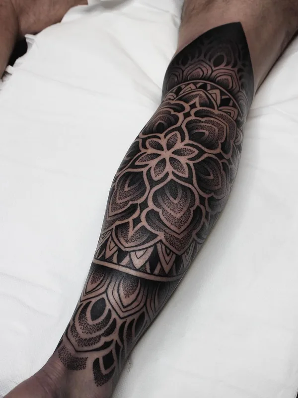 black and grey blackwork tattoo on calf #63800 | Tattoo Artist @tommbirchtattoo