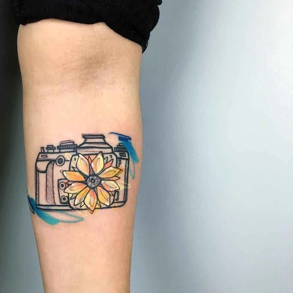 Illustrative Camera, Flower tattoo on Forearm