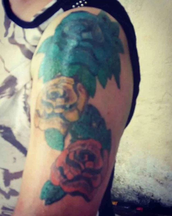 Traditional Rose tattoo on Upper Arm
