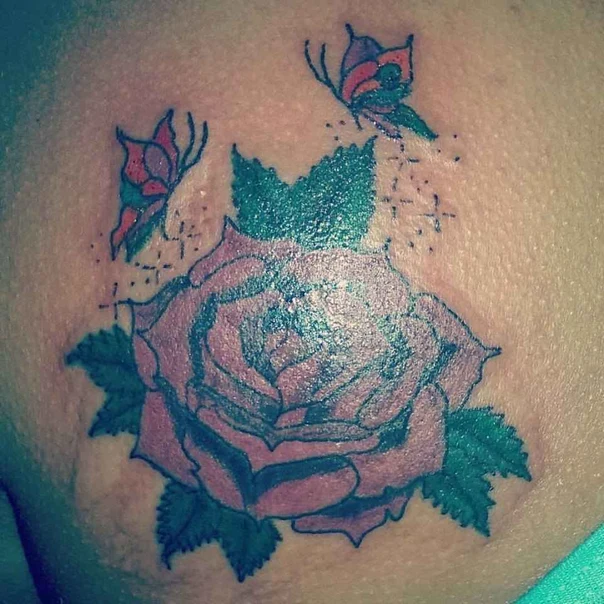 Illustrative Rose, Butterfly tattoo on Shoulder Blade