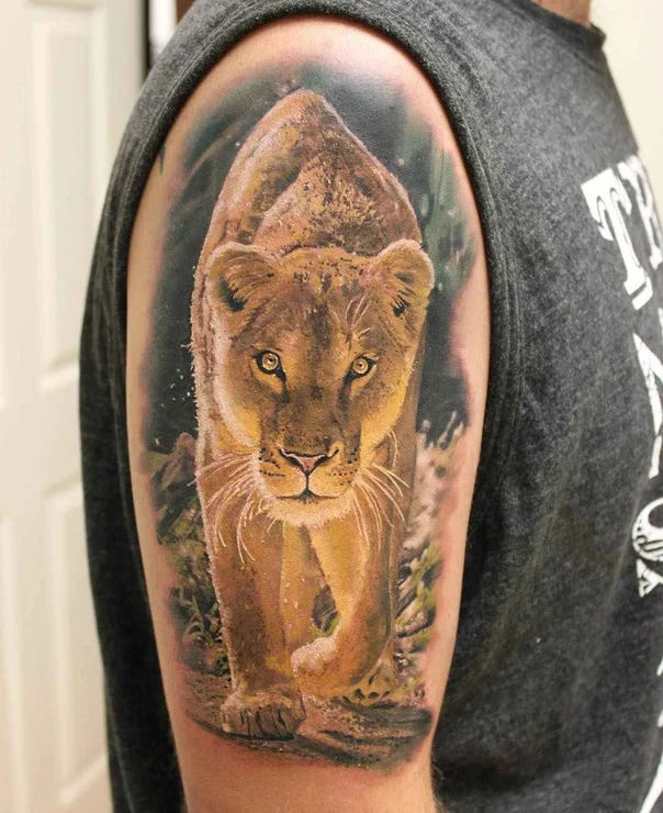 Realism Lion tattoo on Upper Arm