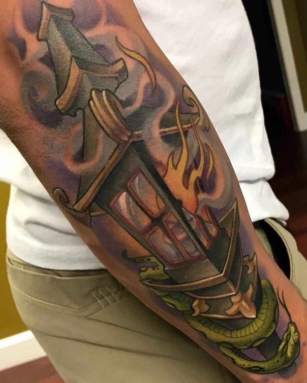 Illustrative Lantern, Snake tattoo on Forearm