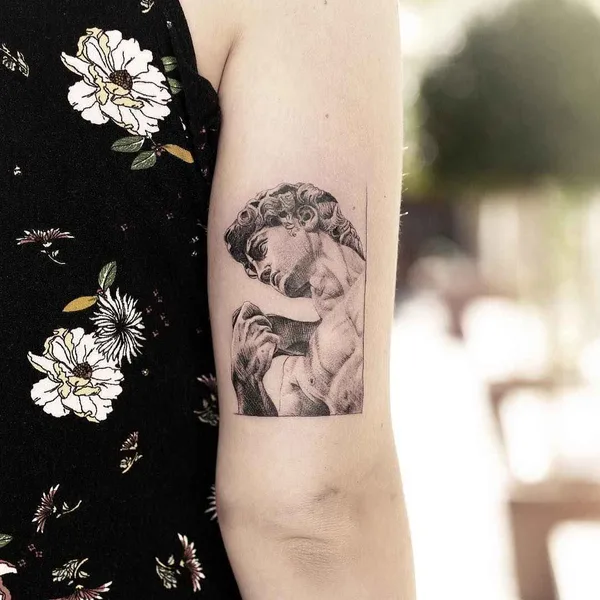 Graphic tattoo by Alessandro Capozzi in Roma