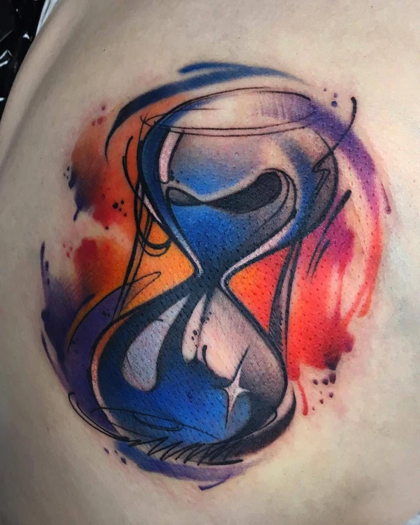 Watercolor Hourglass tattoo on Shoulder Blade