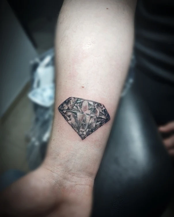 Black & Grey Diamond tattoo on Forearm