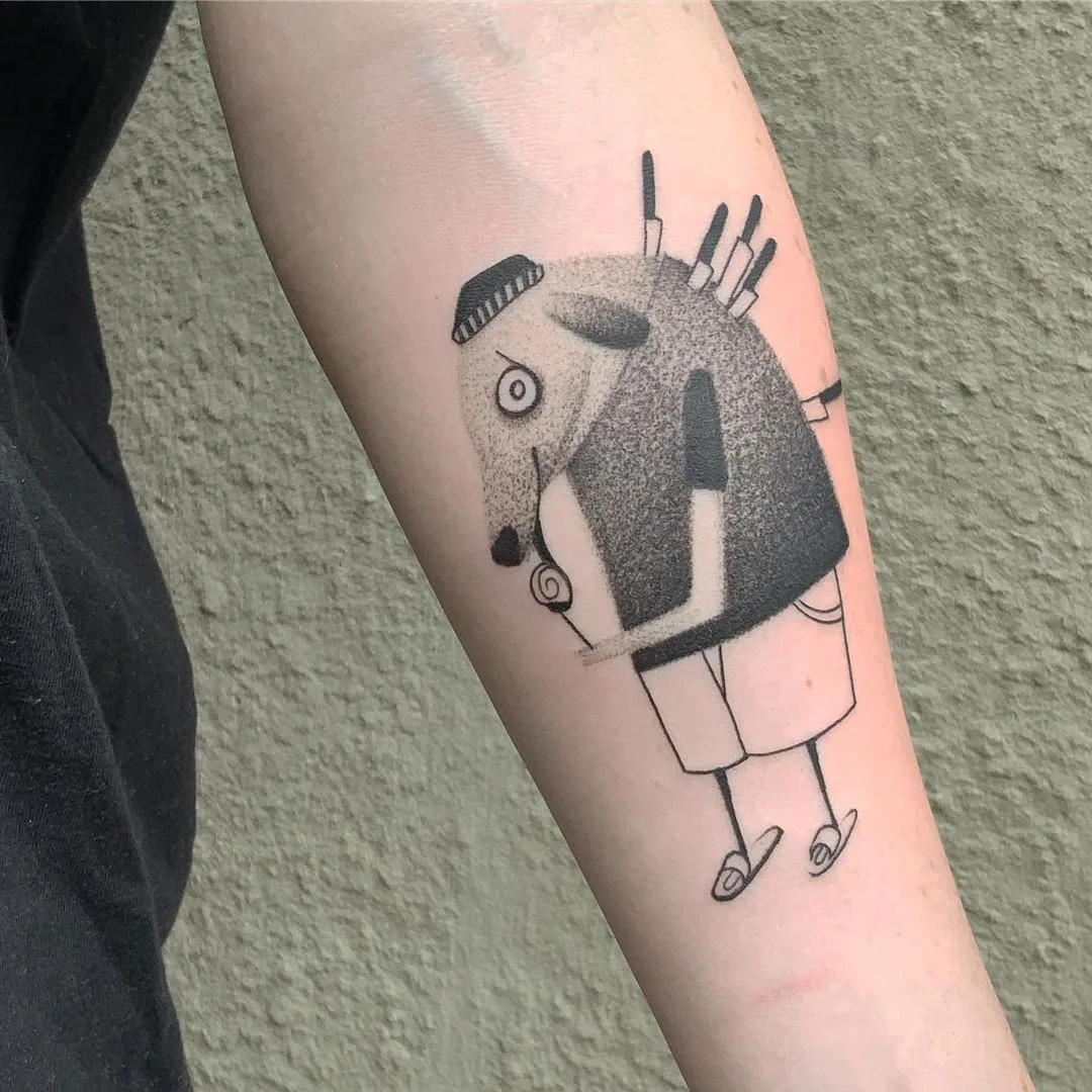 Tattoo artist Wujek, black and grey graphics tattoo with cute animal | Poland