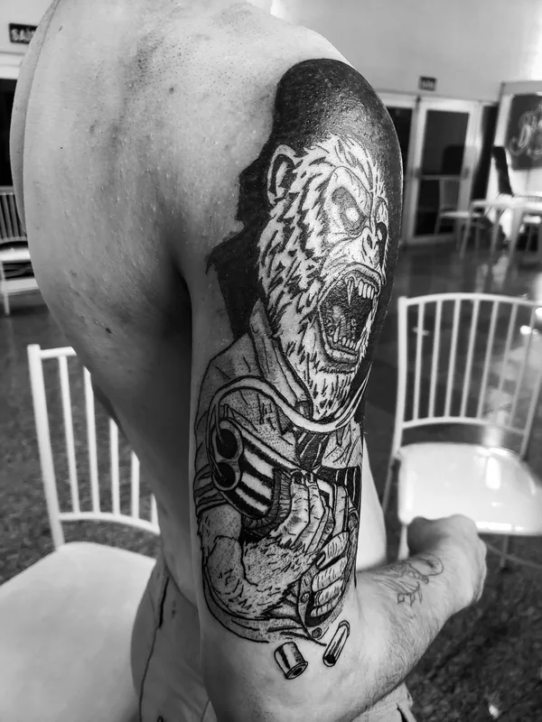 male black and grey blackwork tattoo on upper arm #38603 | Tattoo Artist Paulo R