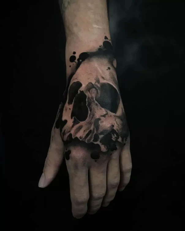 Blackwork Skull tattoo on Back of Hand